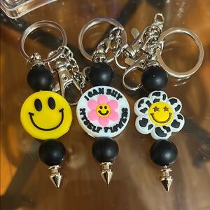 Smiley Face Keychain Set - Yellow, White, Black